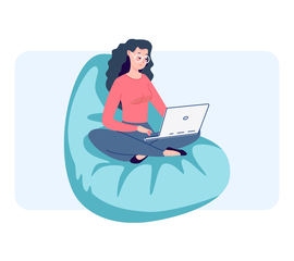 Frau mit Laptop auf einem Sitzkissen